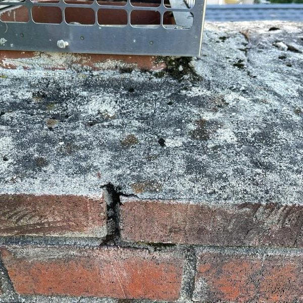 chimney cracks and moss